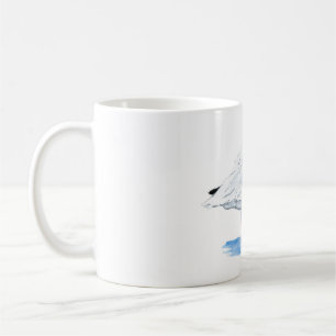 Ibis blanc sur une tasse de café