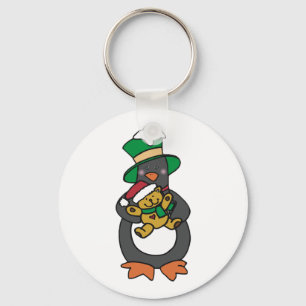 Ierse pinguïn die een kerst-teddybeer vasthoudt sleutelhanger