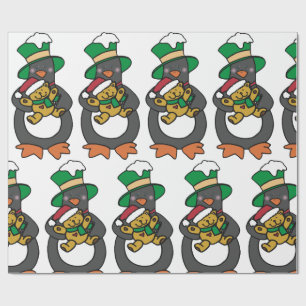 Ierse pinguïn houdt kerst-teddybeer vast cadeaupapier