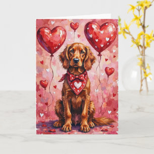 Ierse rode setter Valentine hond zittend met harte Kaart