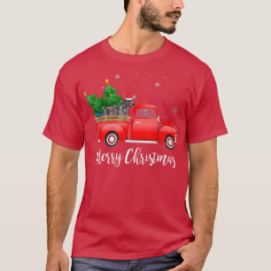 Ierse Wolfshond rijdt in rode vrachtwagen met Kers T-shirt