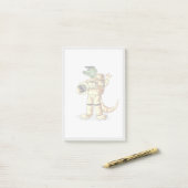 Iguanodon gekleed in een kosmonautenruimtepak. post-it® notes (Op bureau)