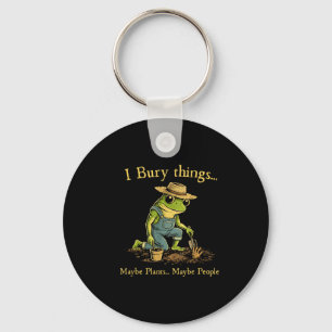 Ik begraaf dingen misschien planten misschien mens sleutelhanger