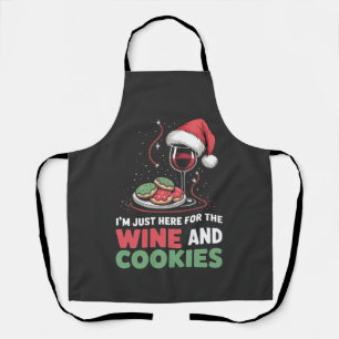 Ik ben hier alleen voor de wijn en kerstkoekjes schort