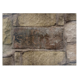 "Ik ben Stuck" een andere steen in de muur Snijplank