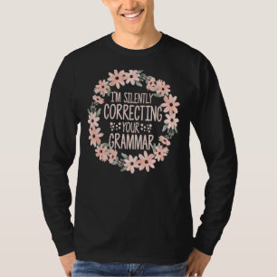 Ik corrigeer in stilte je Engelse grammaticale blo T-shirt