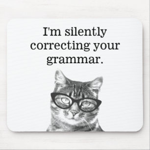 Ik corrigeer stilletjes je grammatica kat muismat