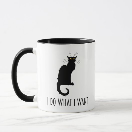 Ik doe wat ik wil dat grappige kat-karatui Noir Mok (Links)