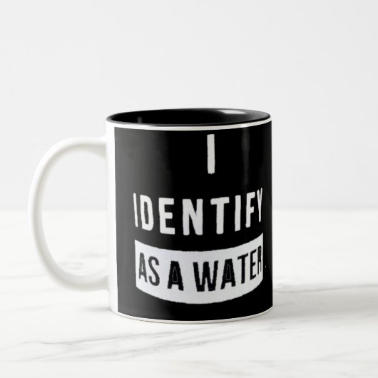 Ik identificeer me als een water tweekleurige koffiemok (Links)