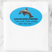 Ik leef met een bruinvis ovale sticker (Tas)