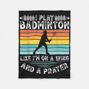 Ik speel badminton zoals ik op een vleugel en een fleece deken