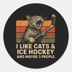Ik vind katten ijshockey leuk en misschien 3 mense ronde sticker