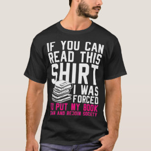 Ik werd gedwongen mijn boek neer te leggen en weer t-shirt