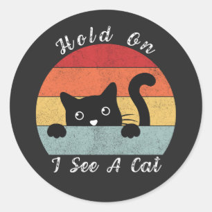 Ik zie een kat, een speelse en een grappige kat. ronde sticker