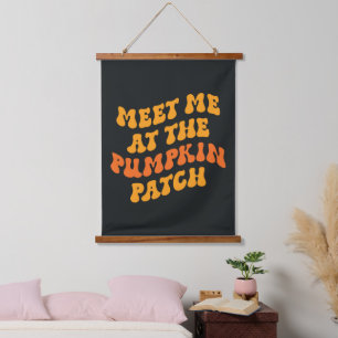 Ik zie me bij de pompoenpleister hangend wandkleed