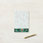 Illustratie met Peacock-veren op zwart Post-it® Notes (Op bureau)