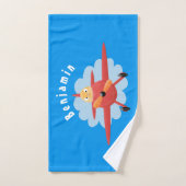 Illustration d'un avion rouge volant mignon (Serviette à main)