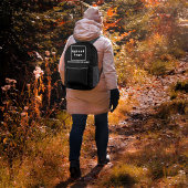 Imprimé Nom commercial et logo sur le sac à dos noir