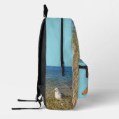 Imprimé Un sac à dos éclaboussant. (Gauche)