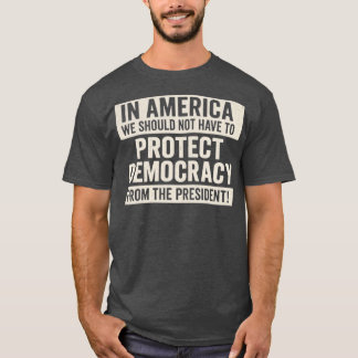 IN AMERIKA HOE VEN WE DEMOCRATIE NIET TE BESCHERME T-SHIRT