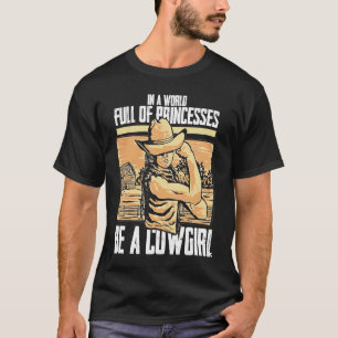 In Eén Wereld Vol Prinsessen Wees Een Cowgirl Coun T-shirt