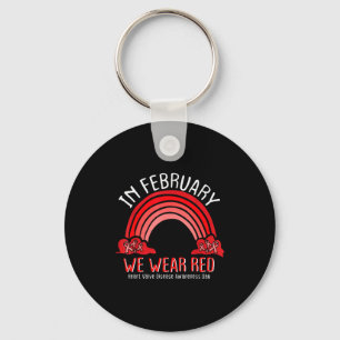 In Februari dragen we Rode Regenboog Hartklepziekt Sleutelhanger