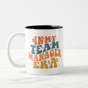 In het tijdperk van de teammanager tweekleurige koffiemok