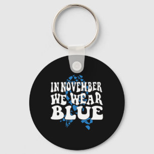 In november Draag we het bewustzijn van de blauwe Sleutelhanger