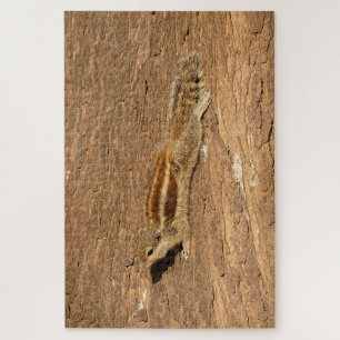 Indische palmvierkant op een boomstam legpuzzel