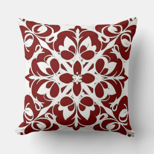 Ingewikkeld rood en wit geometrisch patroon kussen