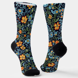 Ingewikkelde bloemkunst: blauwe en oranje bloemen sokken