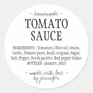 Ingrediënten voor zelfgemaakte tomatensaus in keuk ronde sticker