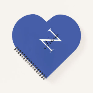 Initiële handgeschreven eigen naam in het blauw me notitieboek
