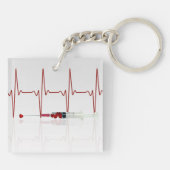 Injectie met rood hart sleutelhanger (Achterkant)