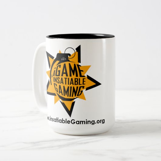 .insatiable. Jeu 15 onces. Tasse (Devant gauche)