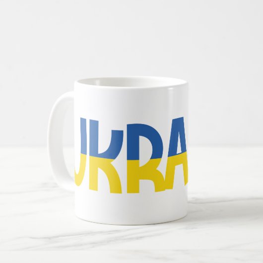 Inscriptie Oekraïne in blauwe en gele kleuren Koffiemok (Voorkant links)