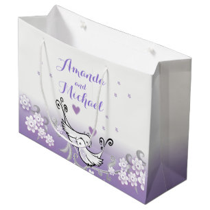 Inséparables en pastel épousant le grand sac
