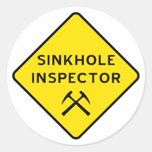 Inspecteur Sticker in Sinkhole