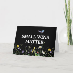 Inspirerende quote met wilde bloemen en vlinder kaart
