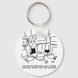 Instructies ontvangen na koken in een keuken sleutelhanger