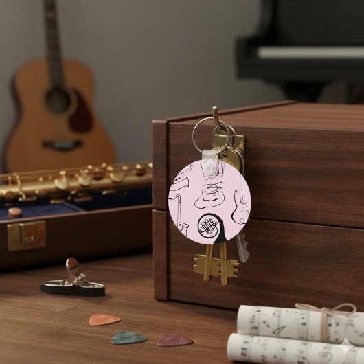 Instruments de musique sur porte-clés rose
