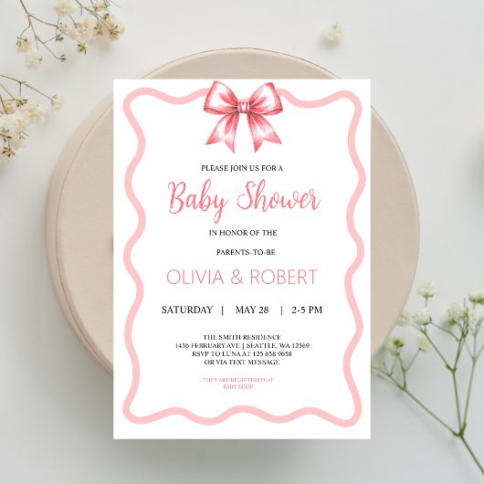 Invitation au Baby shower de ruban rose pour les f