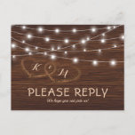 Invitation Carte Postale Rustic Country Grange Mariage en bois RSVP<br><div class="desc">Carte postale réponse mariage de la grange avec un arrière - plan en bois rustique, deux coeurs sculptés, vos initiales et un modèle rsvp moderne. Cliquez sur le bouton "Customiser" pour personnaliser davantage ce modèle. Vous pourrez modifier tout le texte, y compris le style, les couleurs et les tailles. Vous...</div>