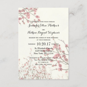 Invitation De jolies fleurs de cerisiers sur un blanc élégant