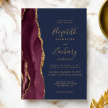 Invitation Moderne Burgundy Gold Agate Marine Blue Mariage<br><div class="desc">Le bord gauche de cette élégante faire-part de mariage moderne est orné d'une bordure d'aquarelle bordeaux bordée d'une fausse parties scintillant dorée. Le texte personnalisable combine écriture manuscrite couleur or,  cuivre et polices italiques sur un arrière - plan bleu marine. L'envers est assorti d'un design d'agate bordeaux et or.</div>