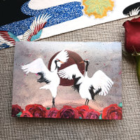 Roses rouges, grues japonaises Tancho, mariage