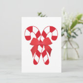 Invitation rouge et blanche de sucres de canne (Debout devant)