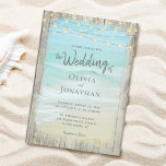 Invitation Rustic Beach Bois Chaîne Lumières Vagues Mariage<br><div class="desc">Les vagues de l'océan s'écrasent contre la plage dans ce design de mariage rustique de plage. Des lumières à cordes décorent le dessus, et les détails importants sont encadrés de bois patiné. Ces invitations de mariage sont parfaites pour les mariages de destination, ainsi que tous les mariages à thème de...</div>