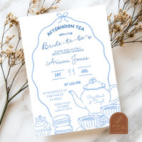 Thé de l'après-midi pour la mariée avec un nœud bl