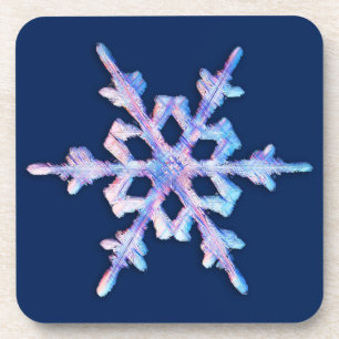 Iridescent sneeuwvlok op donkerblauw bier onderzetter